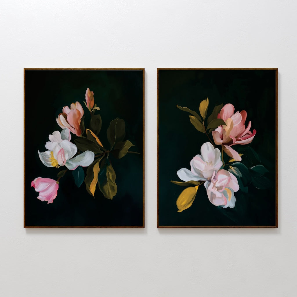 The Midnight Blossoms Set of 2 features elegant framed paintings of blooming flowers with pink, white, and yellow petals on a dark backdrop—perfect as a striking Nordic Park decor accent when hung side by side on a white wall.