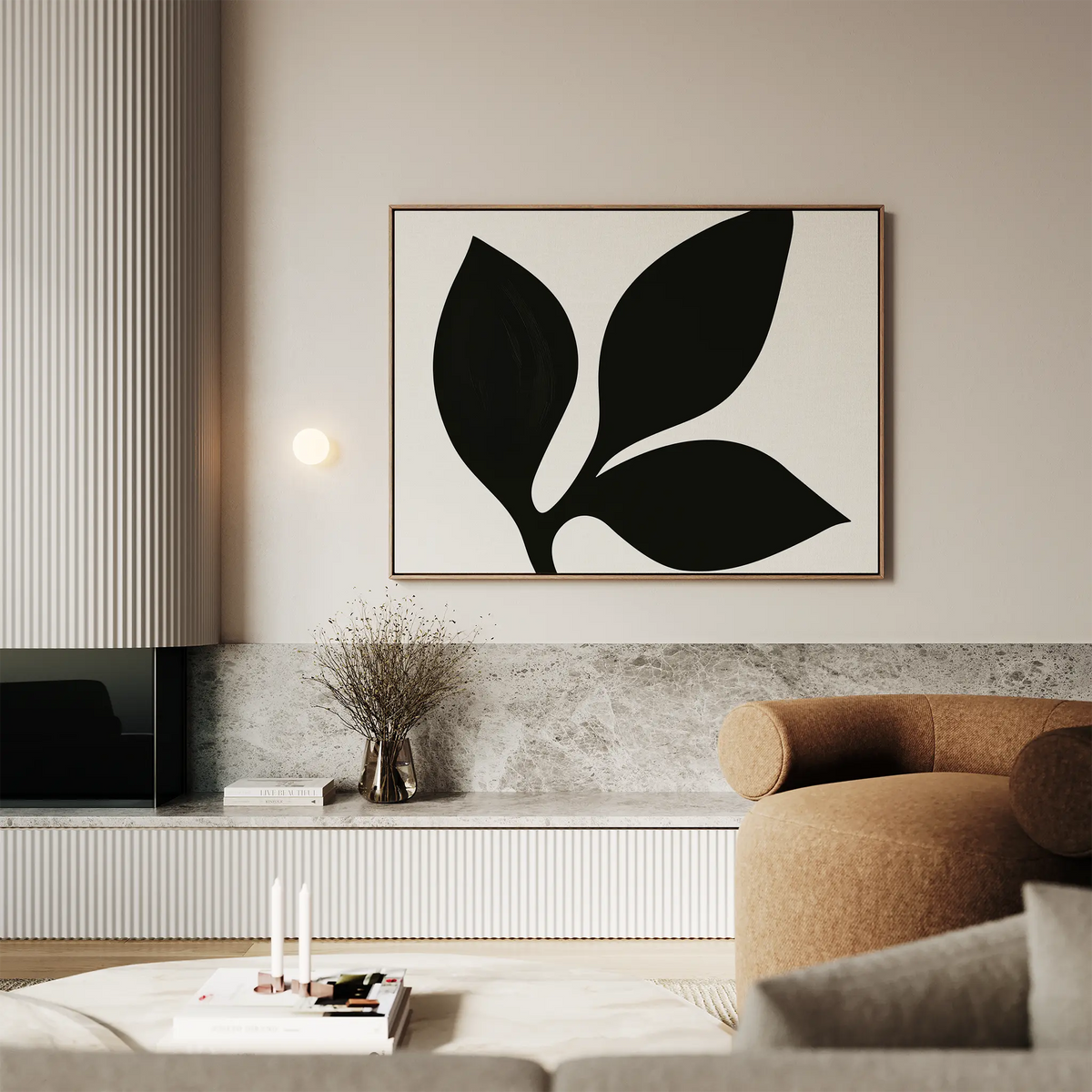 A modern living room features the Midnight Botanist Canvas Art above a brown curved sofa, complemented by a minimalist light fixture, dried flowers in a vase, and a marble-topped low shelf—perfect for stylish decor.