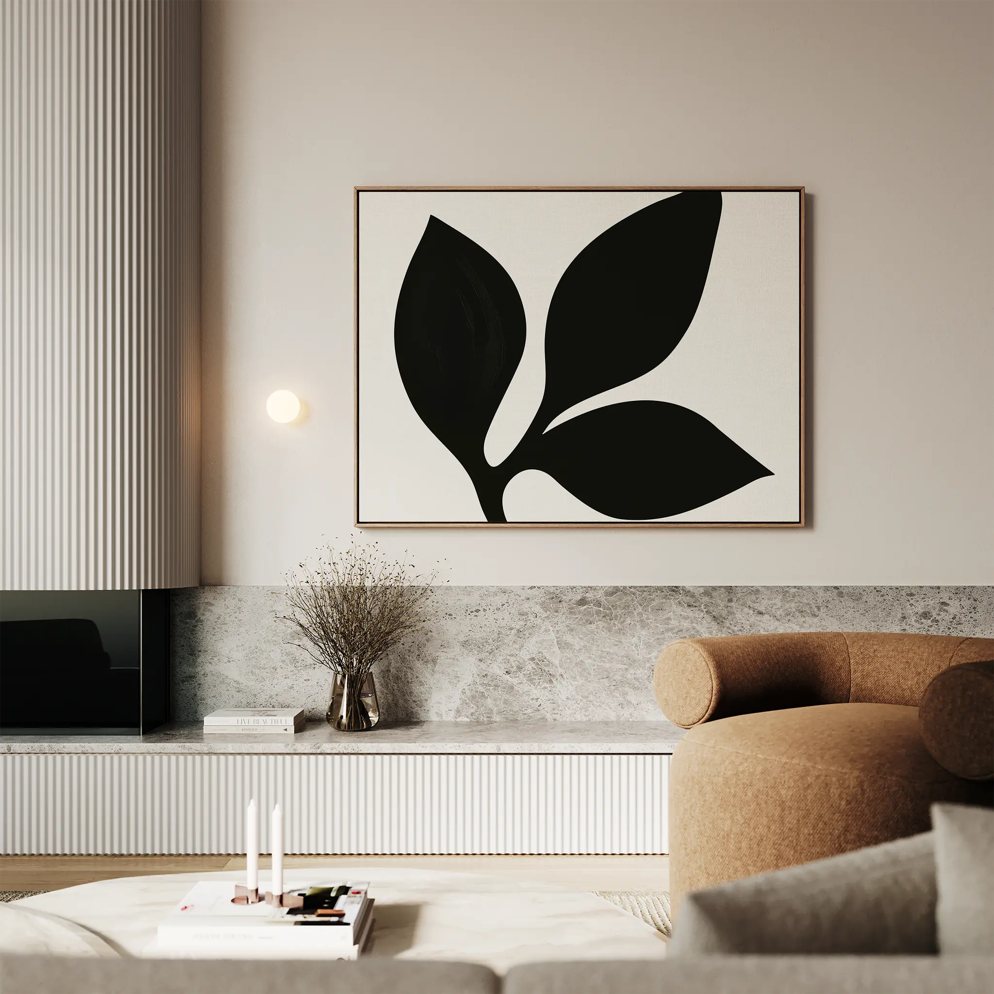 A modern living room features the Midnight Botanist Canvas Art above a brown curved sofa, complemented by a minimalist light fixture, dried flowers in a vase, and a marble-topped low shelf—perfect for stylish decor.