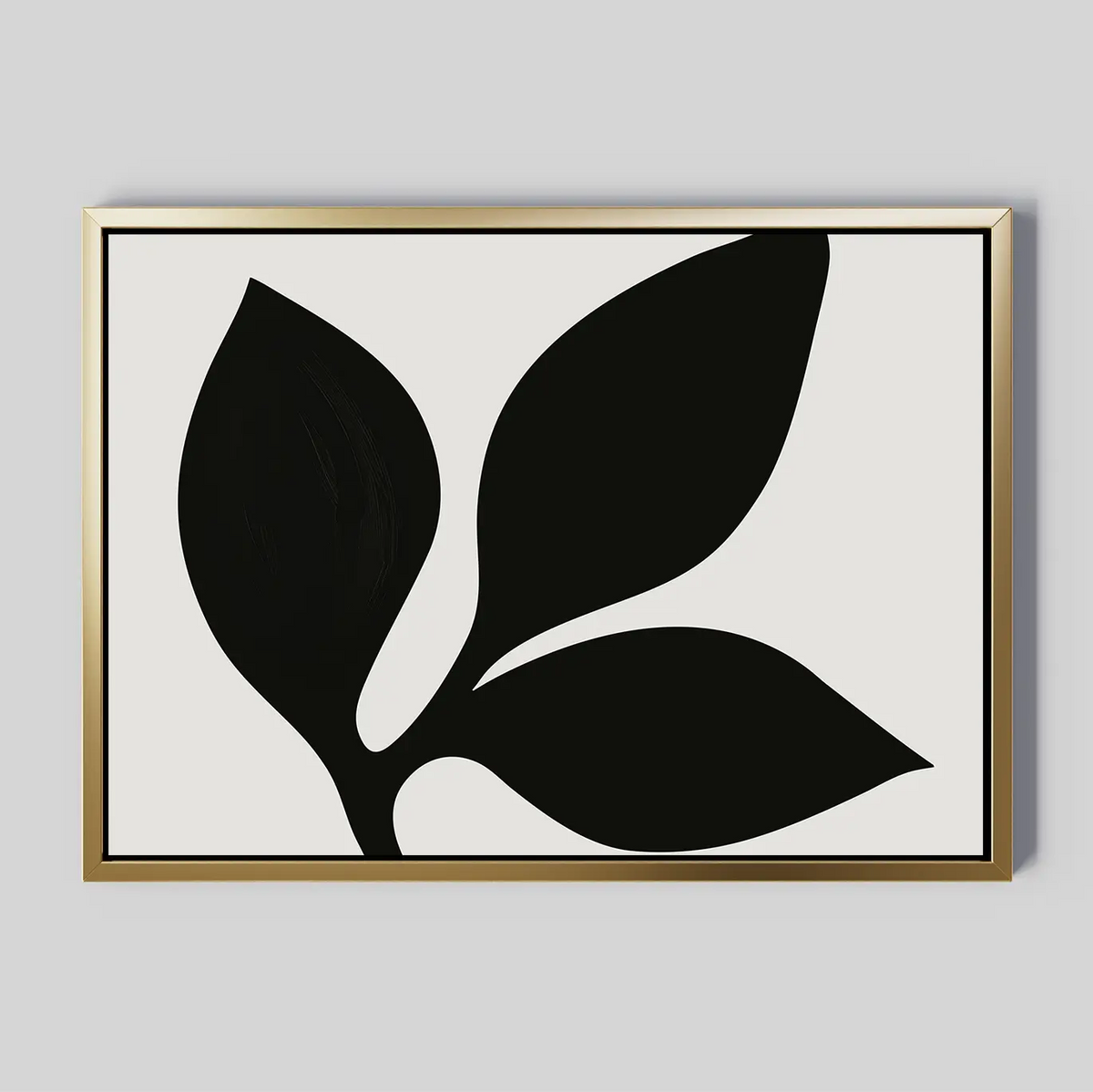 The Midnight Botanist Canvas Art showcases a black abstract leaf on a white background in a slim gold frame—an ideal minimalist piece for elegant living room decor.
