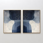 The Midnight Lines Set of 2 features abstract paintings in gold frames with overlapping blue, gray, and white shapes and thin swirling lines, embodying minimalist and modern wall art when displayed side by side.