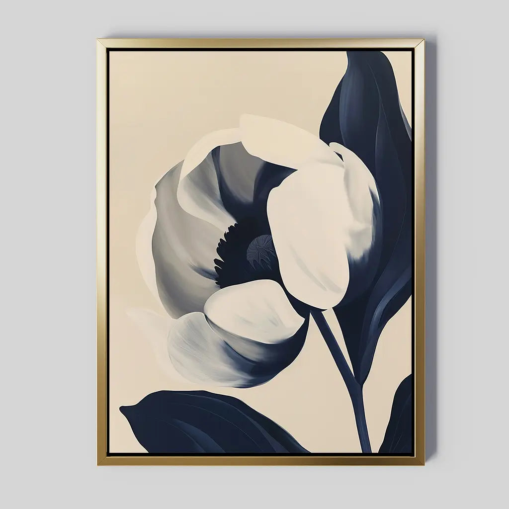 The Midnight Tulip Canvas Art showcases a white and dark blue floral design on a light beige background with a gold frame, offering elegant botanical wall art perfect for enhancing living room decor on a light gray wall.