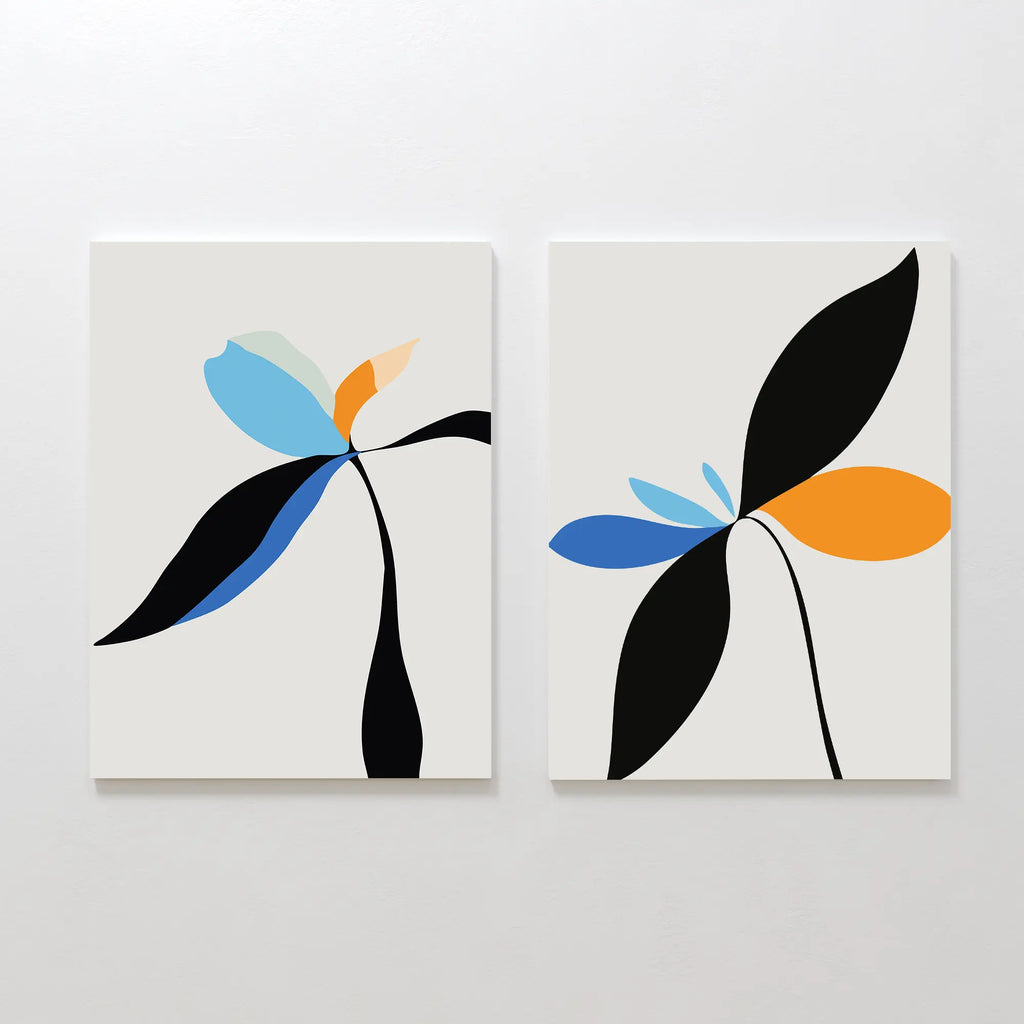 The Minimal Flora Set of 2 features abstract floral prints with minimalist botanical shapes in black, blue, orange, and light green on white—ideal modern wall decor to add a touch of Minimal Flora style to any room.
