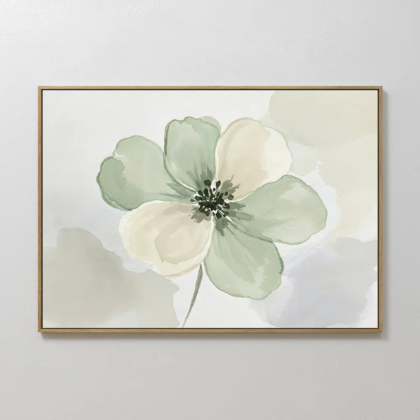 The Mint Meadow Canvas Art is a framed minimalist wall piece featuring a large watercolor flower with soft green and cream petals on a light, abstract background.
