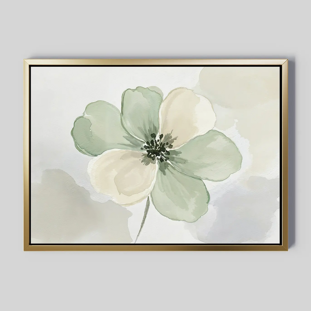 The Mint Meadow Canvas Art features a single flower with pale green and cream petals, a dark center, and a light abstract background. A metallic gold frame adds elegance to this minimalist botanical wall art.