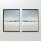The Misty Morning Set of 2 features framed Nordic Park abstract prints in soft blue, white, and beige, displayed side by side on a white wall for a minimalist look that creates a tranquil atmosphere.