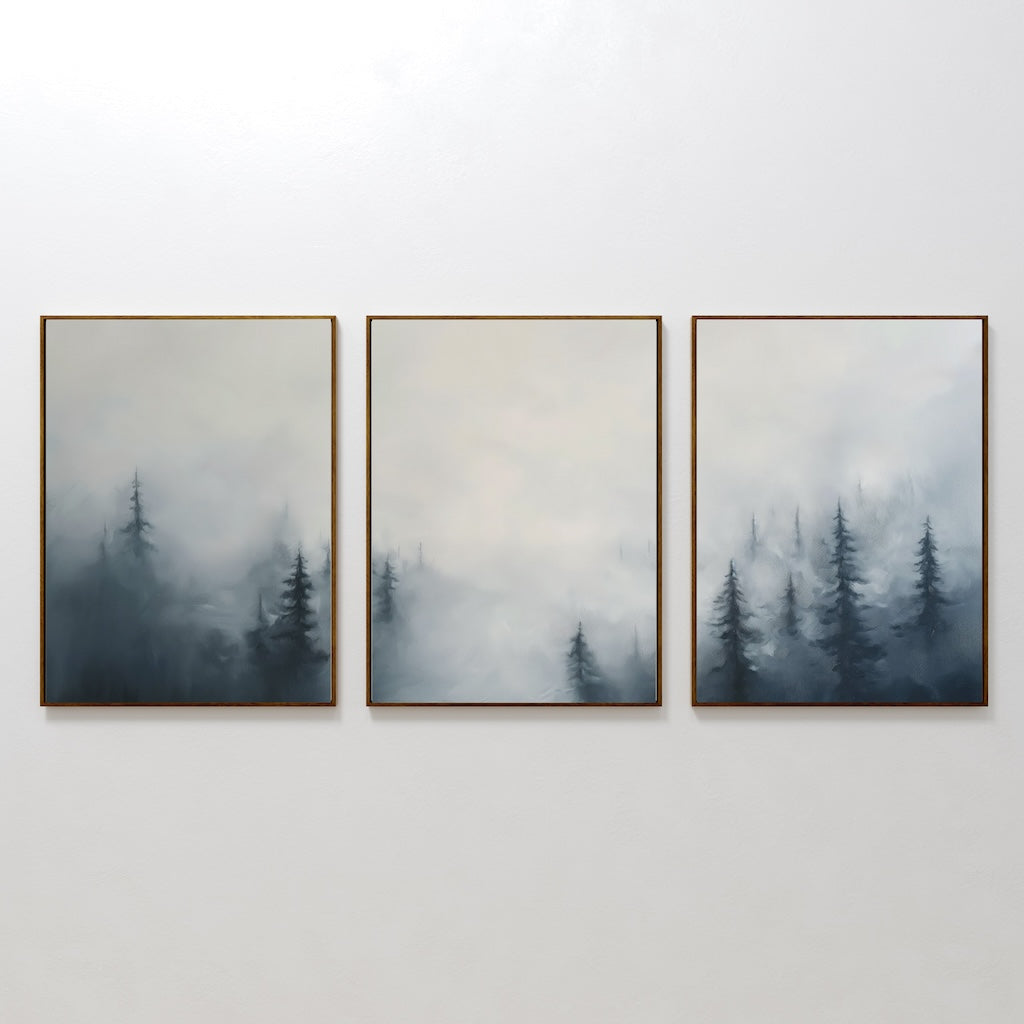 The Misty Pines Set of 3 features framed artworks of dark evergreen trees fading into a foggy sky, creating minimalist wall art perfect for any Nordic Park-inspired space.