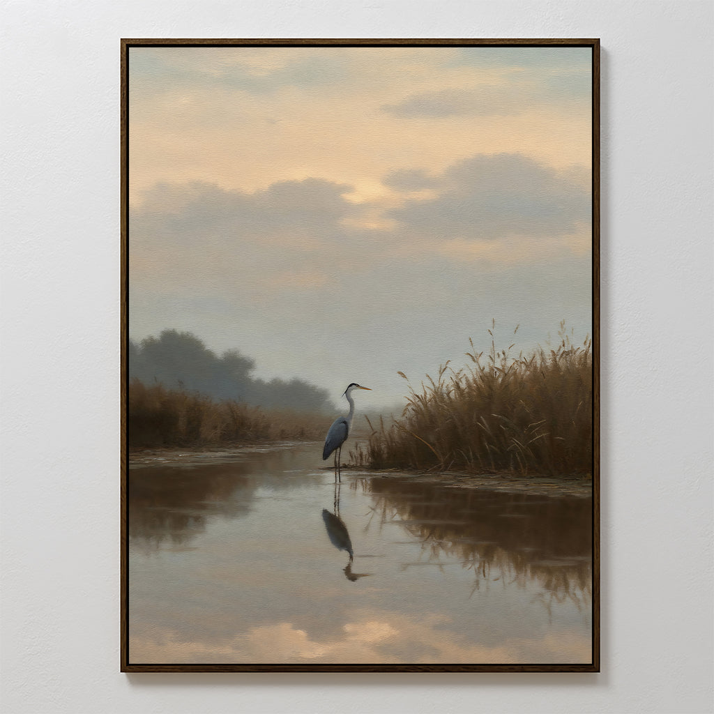 Misty Reflection Canvas Art features a heron in shallow water amid tall grasses, its reflection on the calm surface. Soft pastel clouds evoke sunrise or sunset, making this serene artwork a perfect addition to any space.