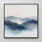 Misty Ridge Canvas Art features minimalist, layered blue and gray mountains with soft, misty edges on a light background, creating a calm and serene atmosphere—ideal as large abstract wall art for any space.