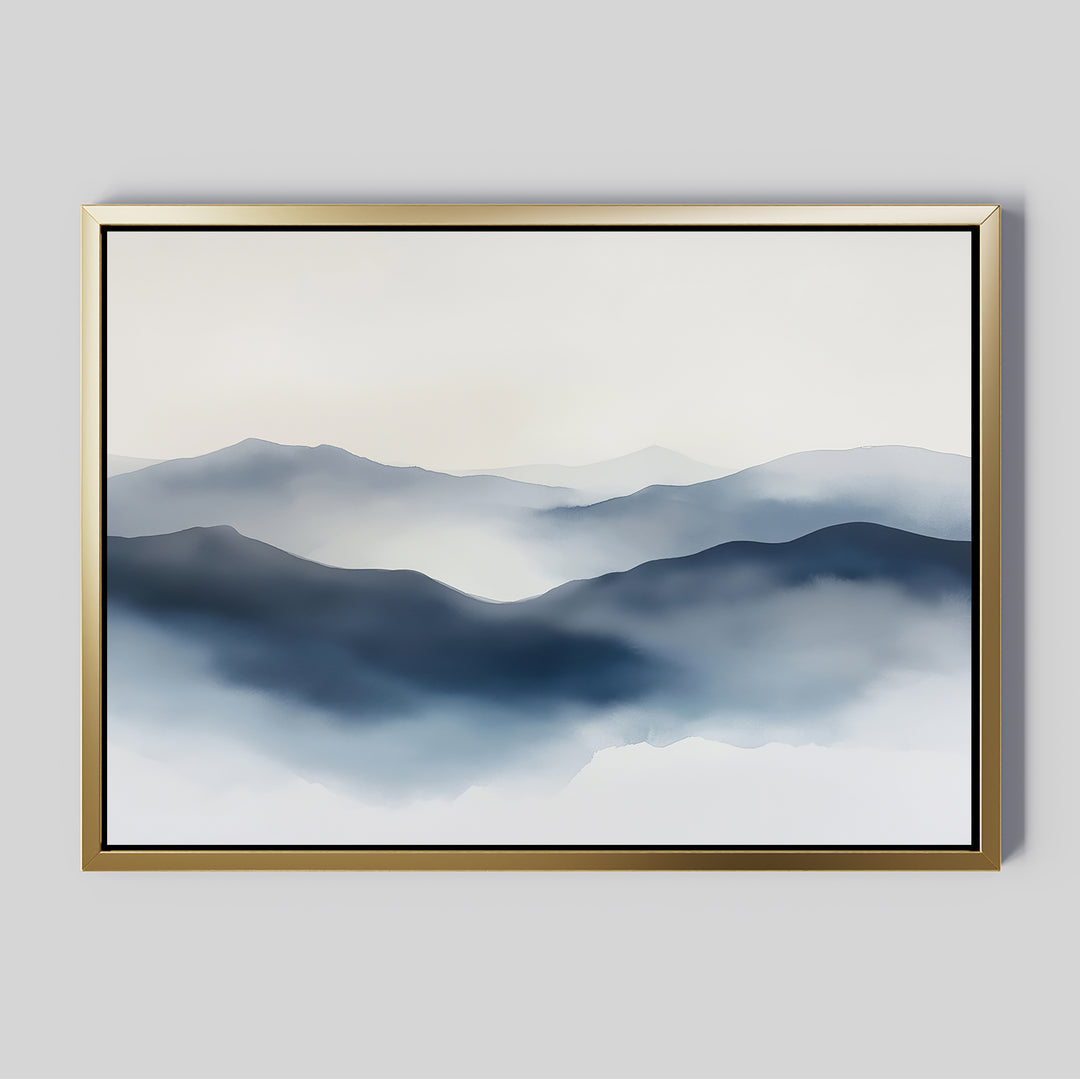 The Misty Ridge Canvas Art – Horizontal features a large framed canvas with soft blue mountain gradients on a gray background. Its gold frame enhances the calm, minimalist design, adding elegance to this abstract landscape wall art.
