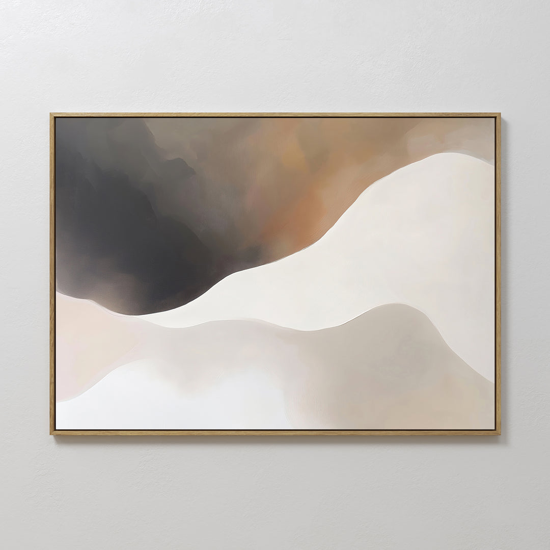 The Misty Silhouette Canvas Art – Horizontal features soft, wavy shapes in beige, cream, brown, and black tones. Framed in thin gold and set against a light-gray wall, it’s the perfect minimalist touch for modern living room decor.