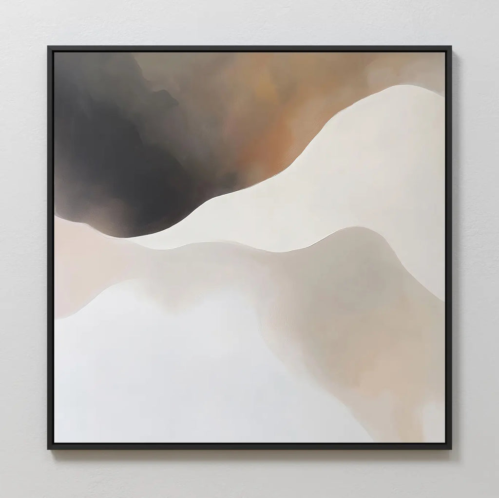 The Misty Silhouette Canvas Art features smooth, flowing curves in black, brown, beige, and white resembling overlapping hills. This minimalist wall art is framed with a thin black border and displayed on a light wall.