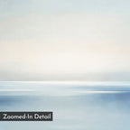 Misty Waters Canvas Art is a softly blurred, abstract painting with pale blue and white horizontal strokes, evoking a calm seascape. "Zoomed-In Detail" appears in a black box in the lower left corner of this minimalist wall art.