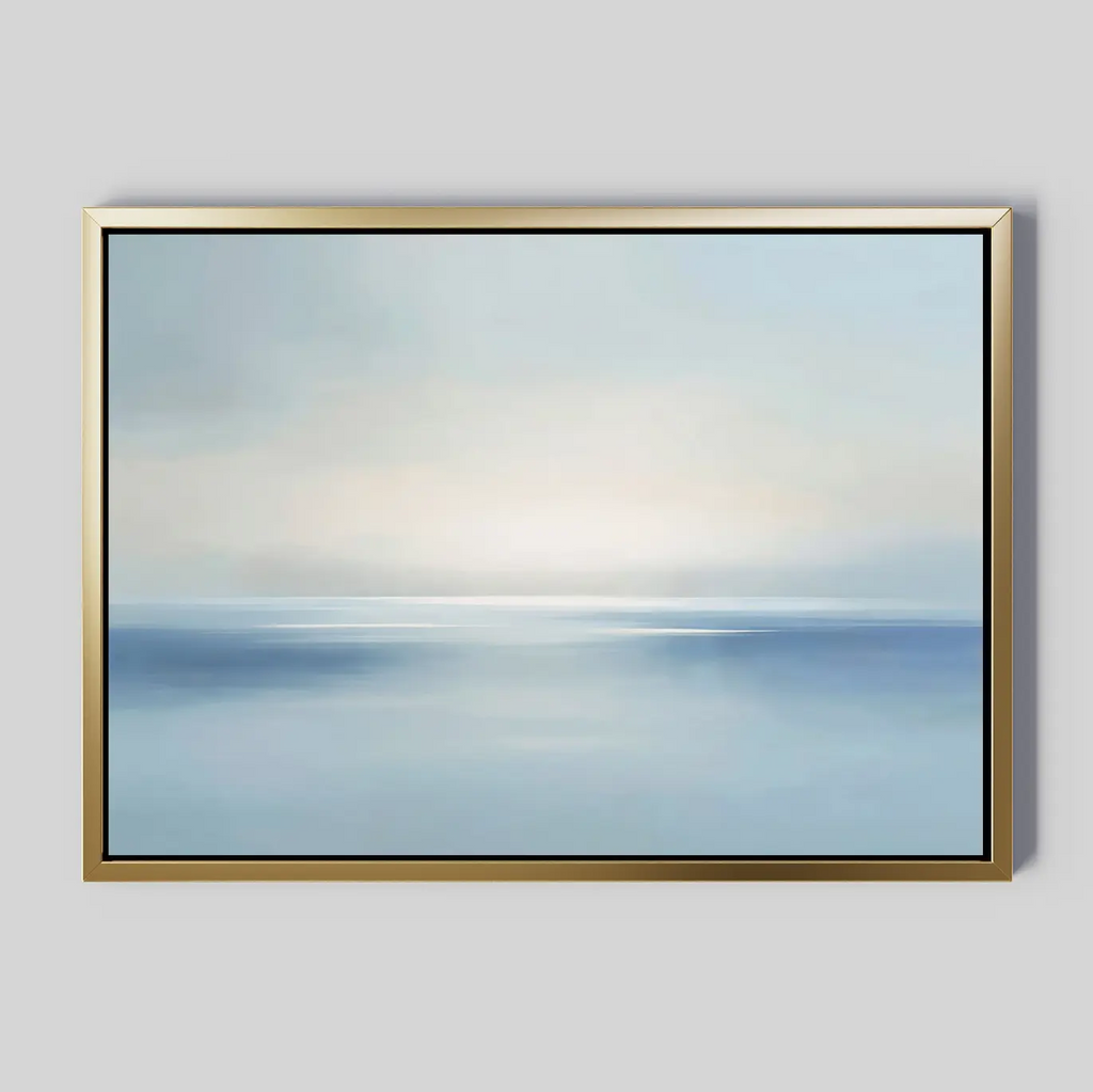 Misty Waters Canvas Art features an abstract seascape in soft blue and white tones with a subtle horizon and sunlight reflections, making it ideal as serene or minimalist wall art against a light grey background.