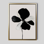 Monochrome Flora Abstract Canvas Art features a black and white floral print with large petals, a thin black stem, and light gray background in a gold frame—ideal minimalist wall art for contemporary spaces.