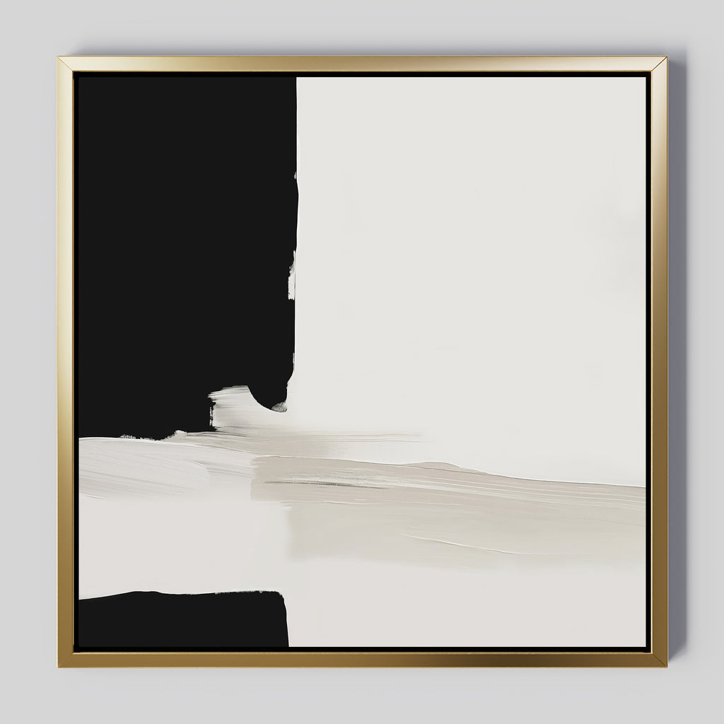 Monochrome Harmony Abstract Canvas Art features bold black and white blocks with soft, blended brushstrokes in a gold frame—perfect minimalist wall decor for a modern touch in any space.