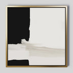 Monochrome Harmony Abstract Canvas Art features bold black and white blocks with soft, blended brushstrokes in a gold frame—perfect minimalist wall decor for a modern touch in any space.