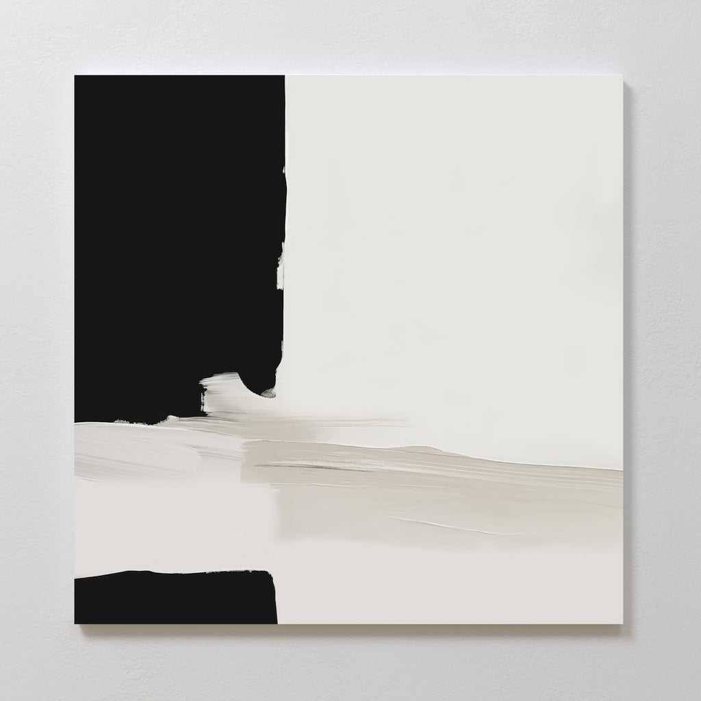 Monochrome Harmony Abstract Canvas Art features a bold black vertical section on the left, a large white area on the right, and soft beige and grey brushstrokes—minimalist wall art perfect for modern home decor.