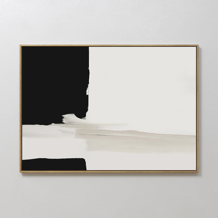 Monochrome Harmony Canvas Art – Horizontal: A minimalist piece with a black block on the left, larger off-white area on the right, and intersecting beige and gray brushstrokes. Framed and displayed on a light-colored wall for a modern look.