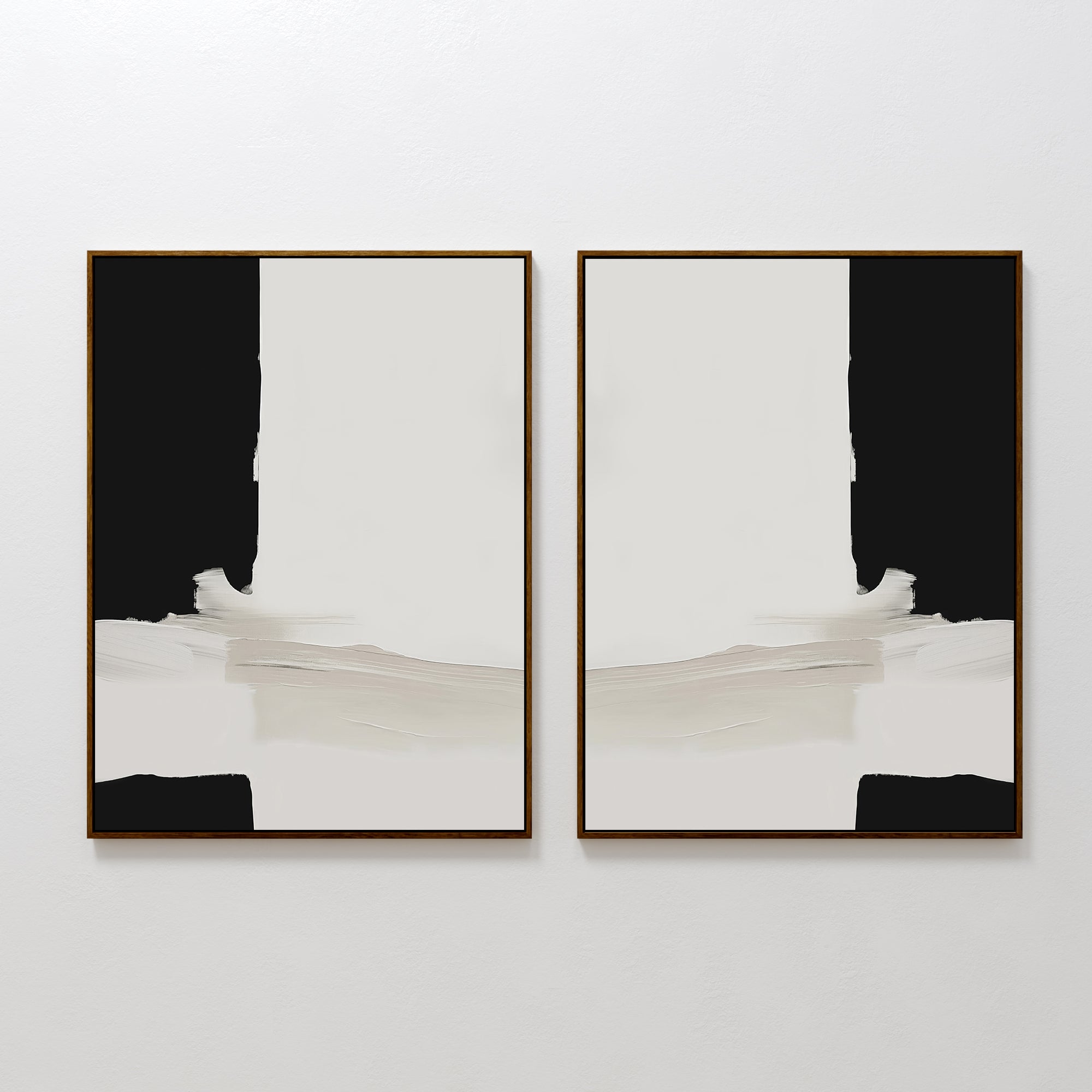 The Monochrome Harmony Set of 2 features abstract art with bold black areas and off-white strokes on white backgrounds, arranged side by side. Each piece is framed in slim, gold frames, offering a modern, mirrored minimalist look.