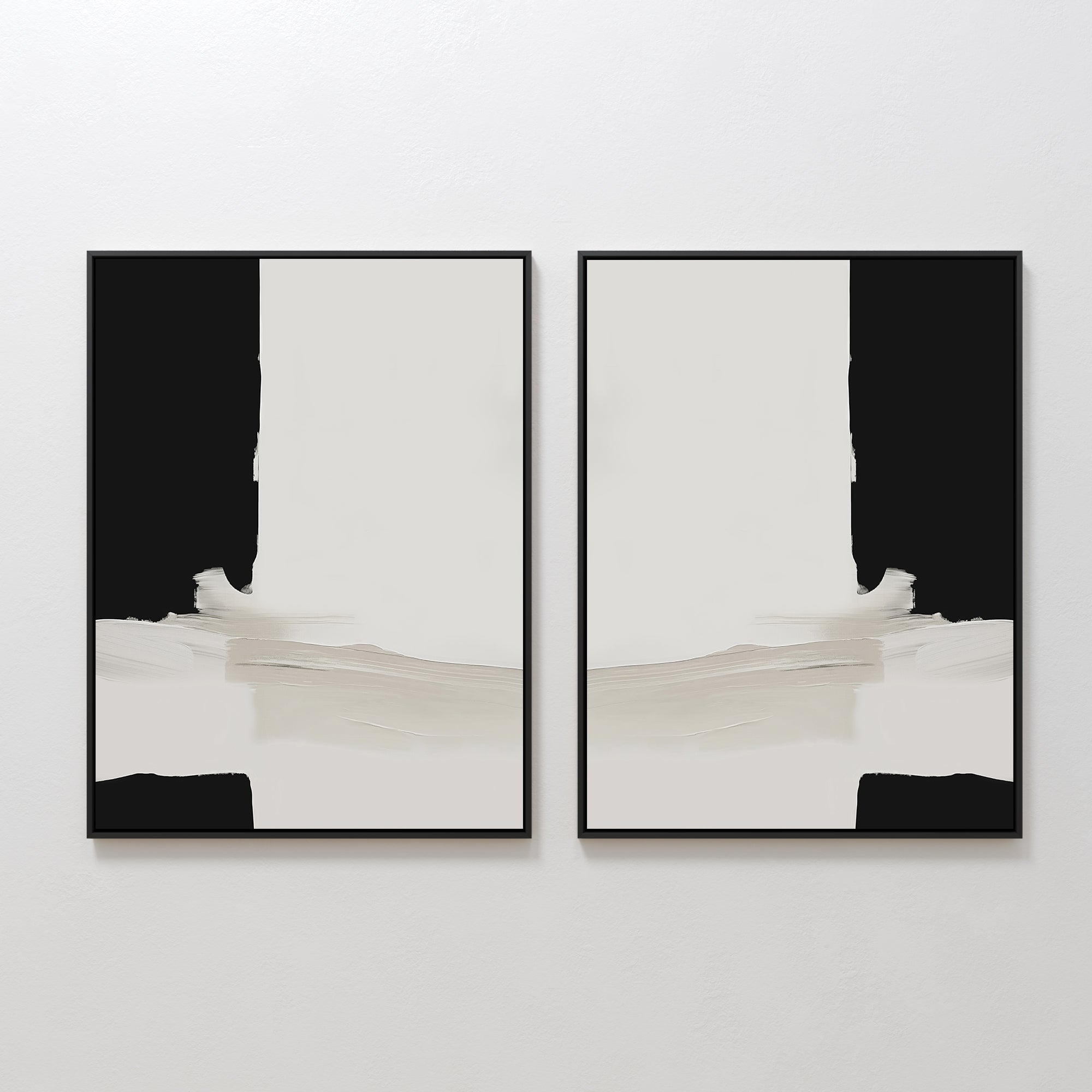 The Monochrome Harmony Set of 2 features bold black forms and pale beige brushstrokes in mirrored compositions, creating striking minimalist wall art with a contemporary aesthetic.