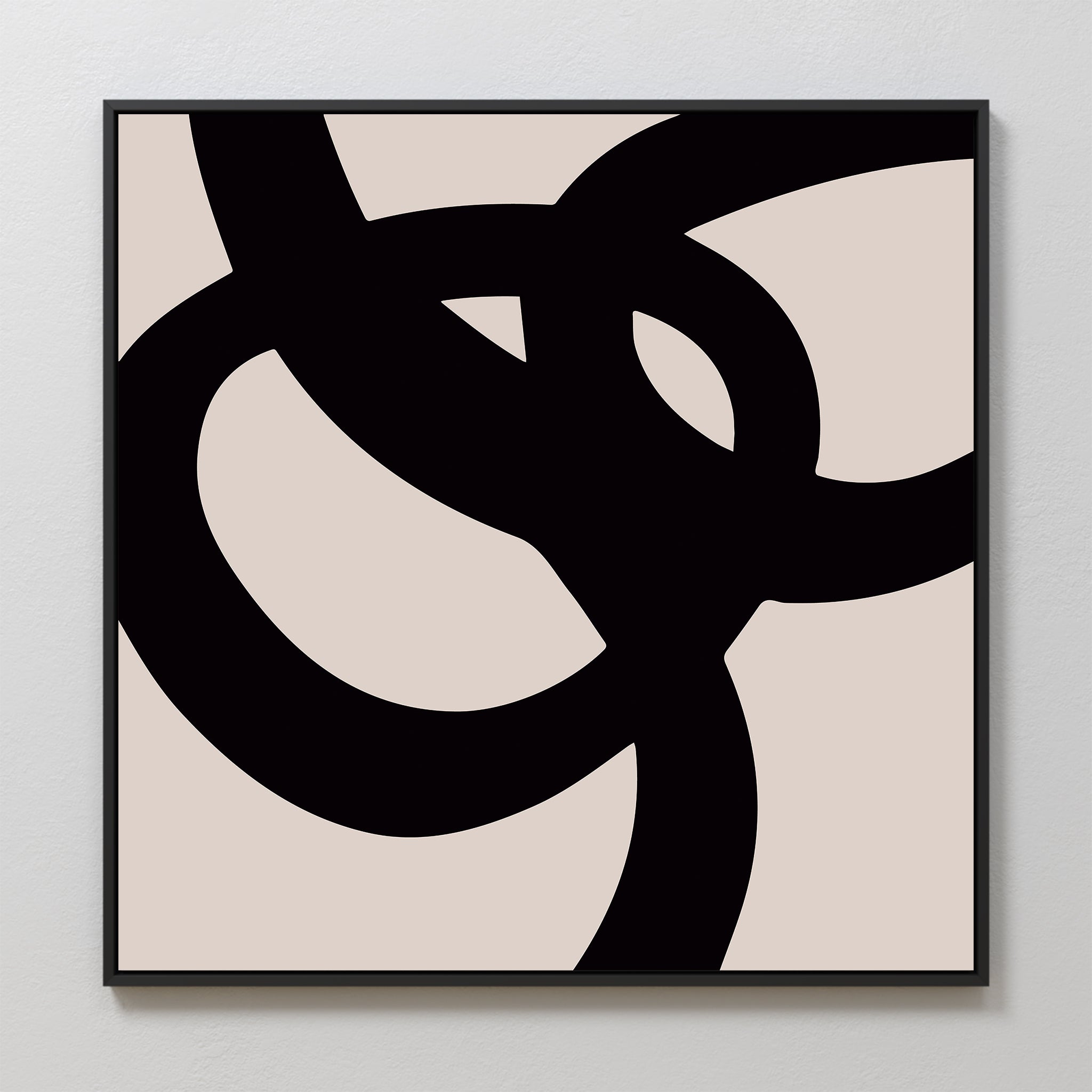 The Monochrome Stream Abstract Canvas Art features bold black intersecting curves on a beige background, adding modern minimalist elegance to any living room when hung on a light wall.