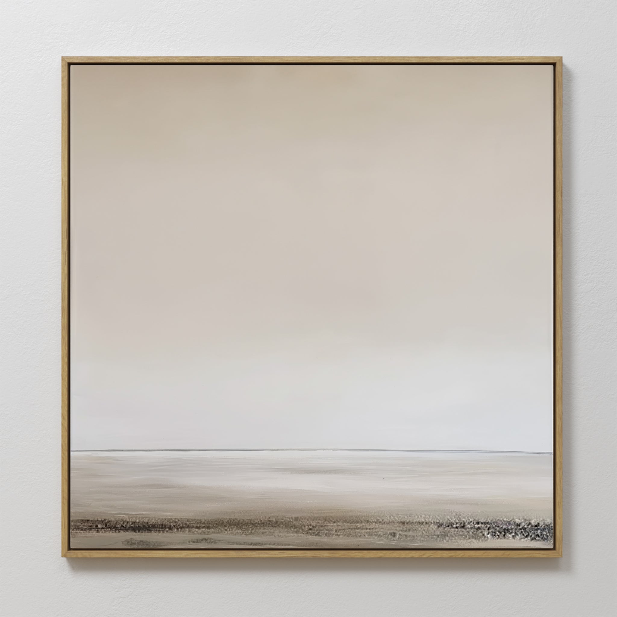 The Morning Mist Abstract Canvas Art features neutral tones, a blurred horizon, and a thin golden frame for modern elegance, creating a minimalist look as it hangs on a white wall.