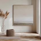 Minimalist living room featuring the Morning Mist Abstract Canvas Art as serene wall décor, a clear vase with dried pampas grass, a woven basket, and light wood herringbone flooring bathed in natural sunlight.