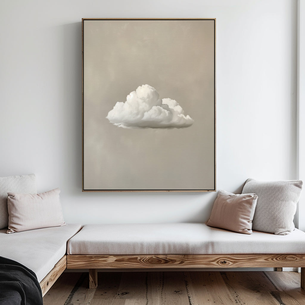 A minimalist living room with light wood furniture, neutral cushions, and the Morning Sky Abstract Canvas Art featuring a single white cloud on a beige wall creates a serene decor.
