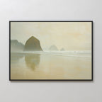 The Morning At Cannon Beach Canvas Art features a misty beach scene with large sea stacks, calm reflections, gentle waves, and distant trees under a cloudy sky—ideal for bringing tranquil coastal vibes to any space.