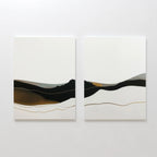 The Mountain Contour Set of 2 features minimalist abstract mountain prints with layered wavy lines in black, white, brown, and gold on a white background, displayed side by side as striking contemporary landscape wall art.