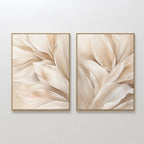 The Natural Texture Set of 2 features framed abstract art with soft beige and cream petal shapes on a light background, adding a calm, gentle movement to your space when displayed side by side on any wall.