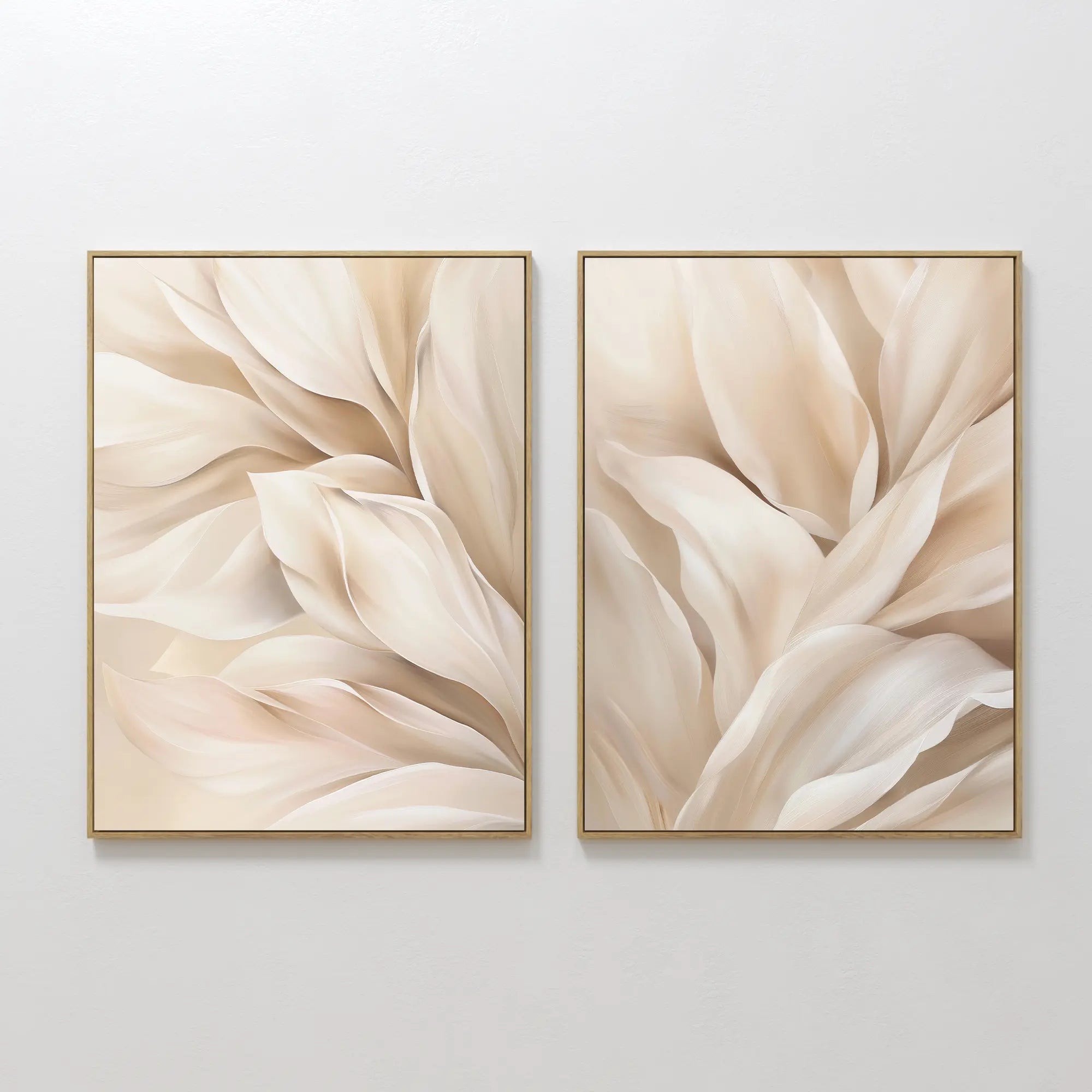 The Natural Texture Set of 2 features framed abstract art with soft beige and cream petal shapes on a light background, adding a calm, gentle movement to your space when displayed side by side on any wall.
