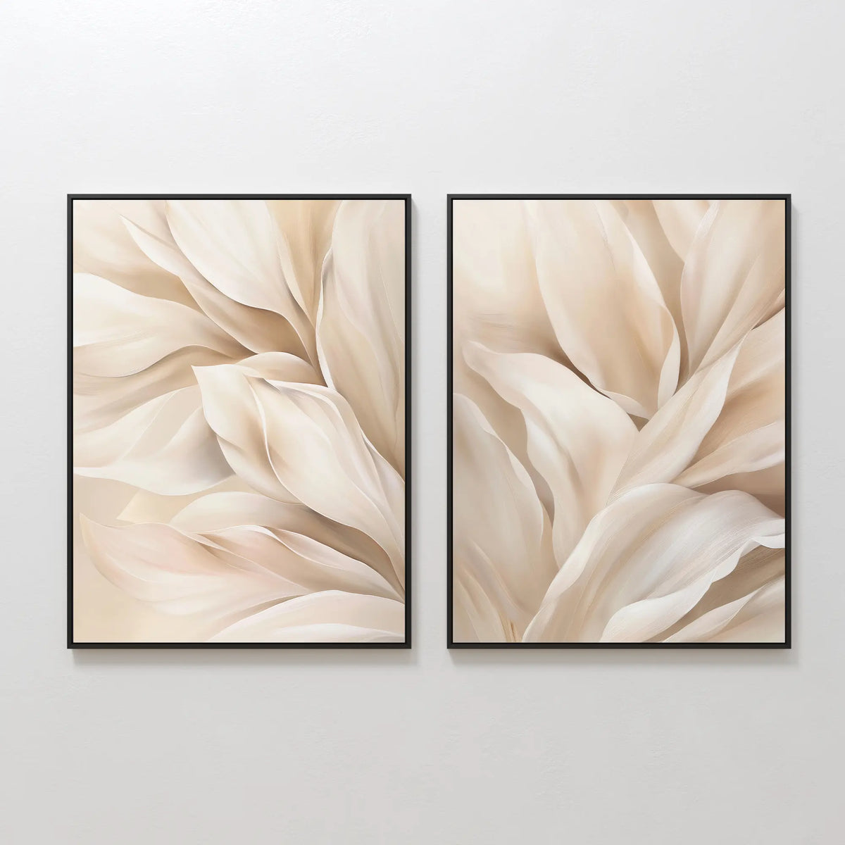The Natural Texture Set of 2 features framed abstract prints with soft, overlapping shapes in neutral beige and cream, creating elegant minimalist wall decor when displayed side by side on a light wall.