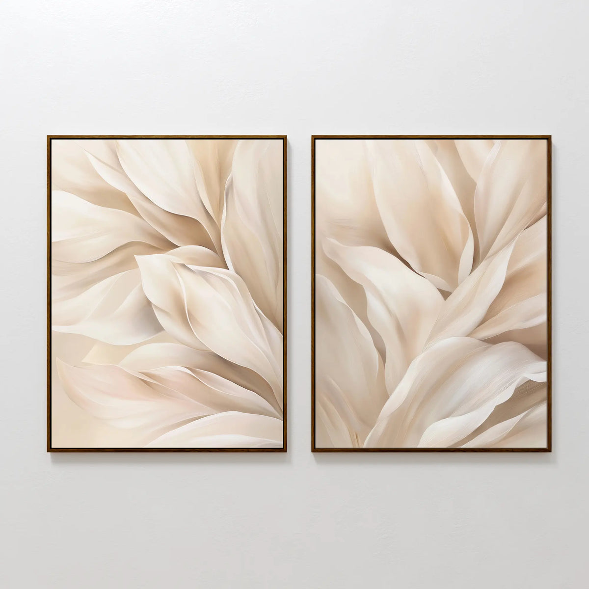The Natural Texture Set of 2 features framed abstract art prints with soft beige and cream shapes, resembling petals or leaves on a light background—ideal minimalist wall decor for any room.