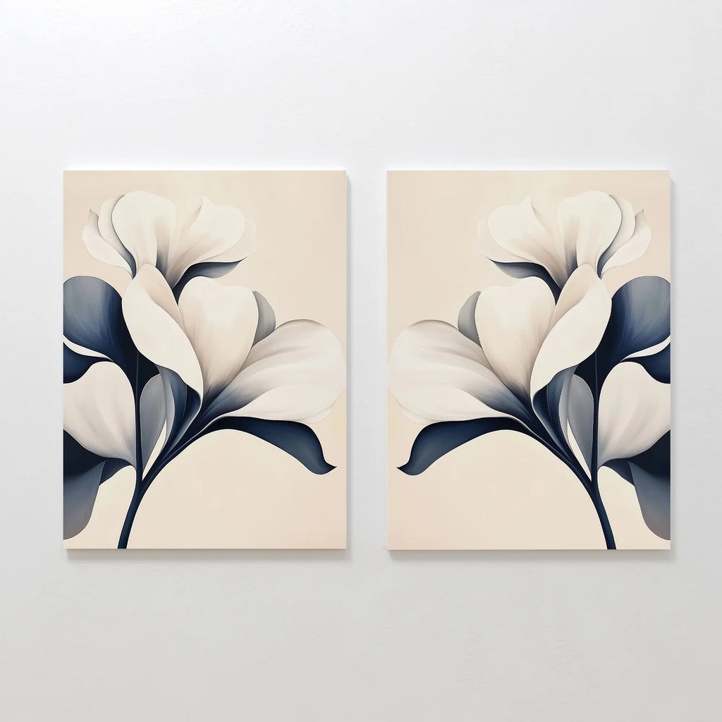 The Navy Magnolia Set of 2 features minimalist canvases with abstract white magnolia flowers and dark blue leaves on a light beige background, creating elegant modern floral wall art.