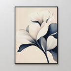 Navy Magnolia Canvas Art: Minimalist wall art showcasing a white magnolia with abstract petals and dark blue leaves on a beige background in a black frame—ideal for elevating your living room or bedroom decor with modern style.