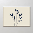 Navy Stem Canvas Art: Minimalist wall art print with thin black branches and dark blue leaves on a light beige background, framed in simple brown wood—perfect modern decor for any white wall.