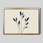 Navy Stem Canvas Art features simple dark blue botanical stems and leaves on a beige background, accented with a gold frame—perfect modern decor for any light gray wall.