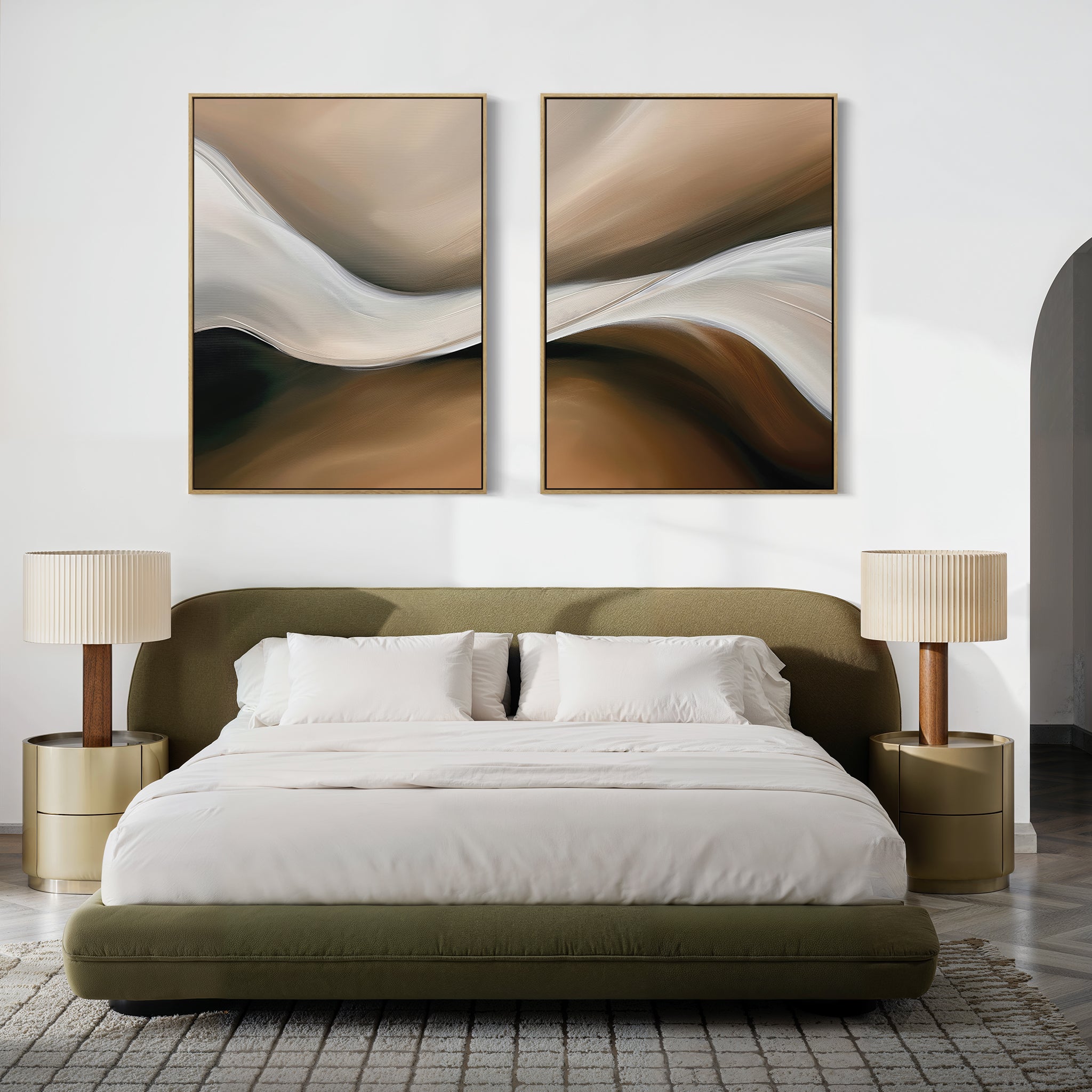 A bed with pillows and lamps in a room featuring the "Neutral Landscape River Set of 2" wall art above the headboard.