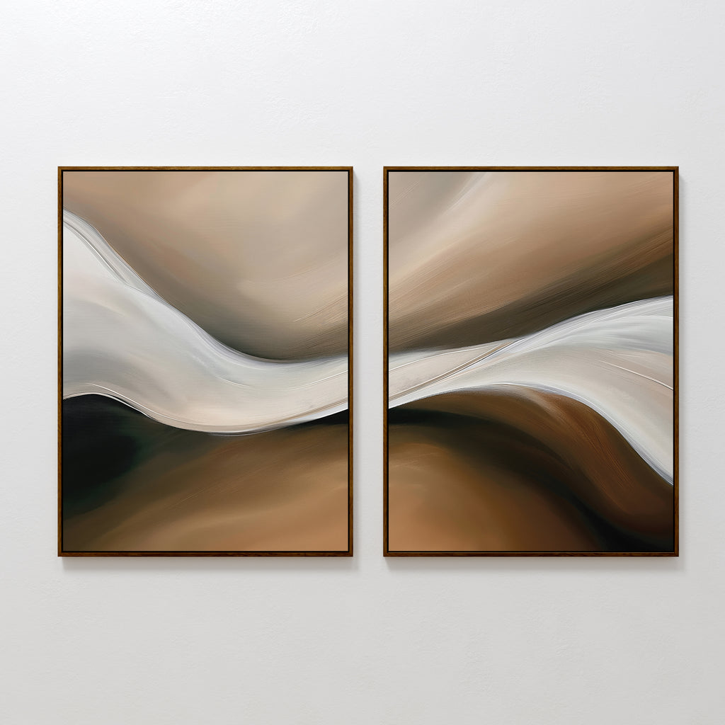 The Neutral Landscape River Set of 2 features framed abstract art with flowing beige, brown, white, and black shapes. This minimalist decor set adds a striking touch to your living room with soothing neutral tones and a sense of movement.