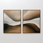 The Neutral Landscape River Set of 2 features framed abstract art with flowing beige, brown, white, and black shapes. This minimalist decor set adds a striking touch to your living room with soothing neutral tones and a sense of movement.