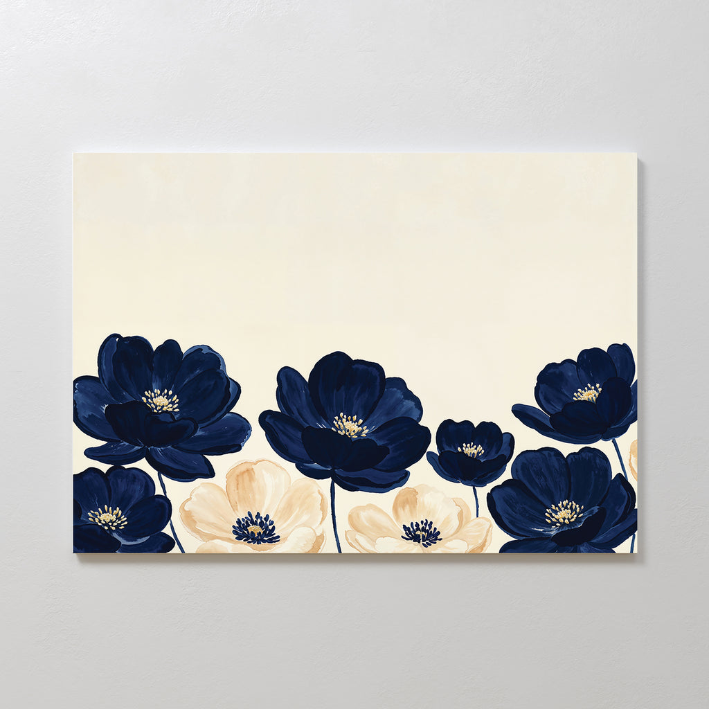The Nightshade Canvas Art – Horizontal features dark blue and beige flowers with bold petals on a light background. This modern wall art displays a row of blooms along the bottom, adding a refined, stylish touch to any space.