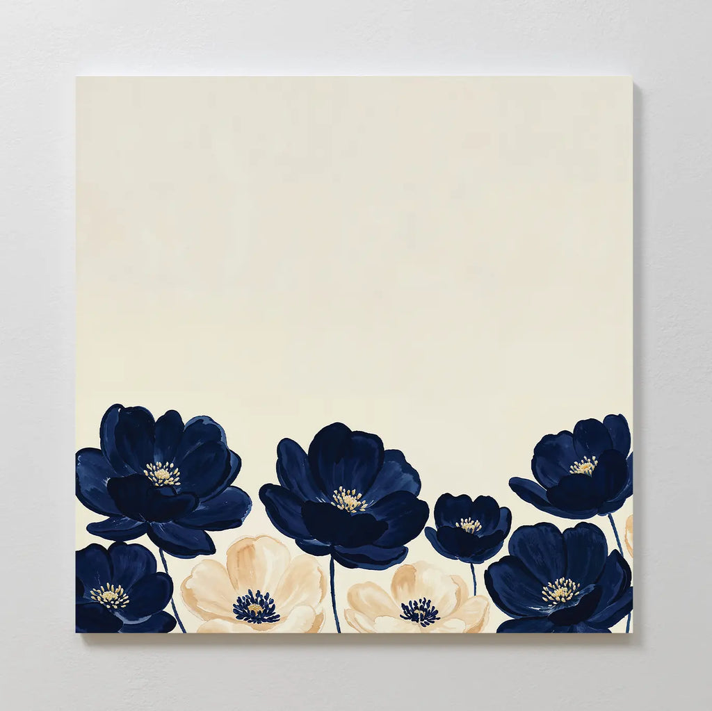 Nightshade Canvas Art is a square piece featuring dark blue and light beige flowers along the cream bottom edge, forming a simple, elegant floral border—ideal minimalist wall decor for modern spaces.