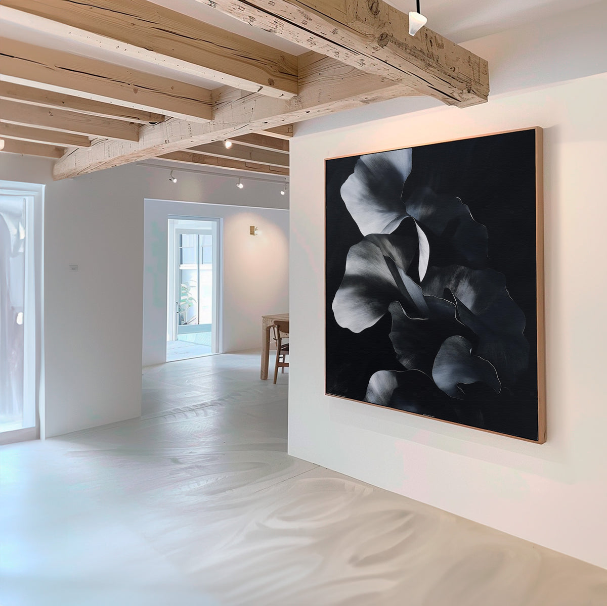 A modern, minimal art gallery with white walls and wooden ceilings showcases the Nocturnal Bloom Abstract Canvas Art as a striking focal point, while natural light from windows highlights the open, airy space.
