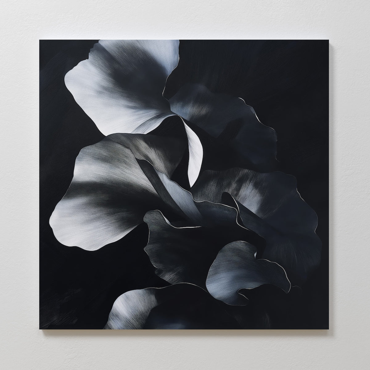 Nocturnal Bloom Abstract Canvas Art features overlapping flower petals in black, white, and gray on a dark background—an elegant and dramatic piece, perfect as modern or dark floral wall art for your space.
