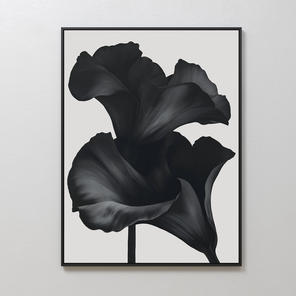Noir Bloom Abstract Canvas Art features two bold, dark monochrome flowers with sweeping petals on a light background. This minimalist modern piece adds an elegant, abstract touch to your living room decor.
