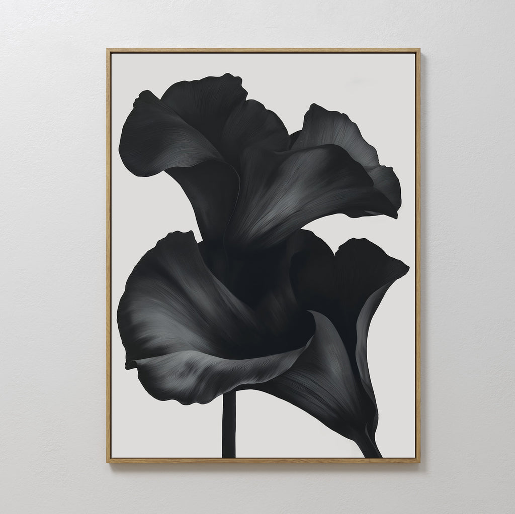The Noir Bloom Abstract Canvas Art features two dark, abstract flower petals on a white background, creating striking minimalist wall decor ideal for enhancing any modern living room.