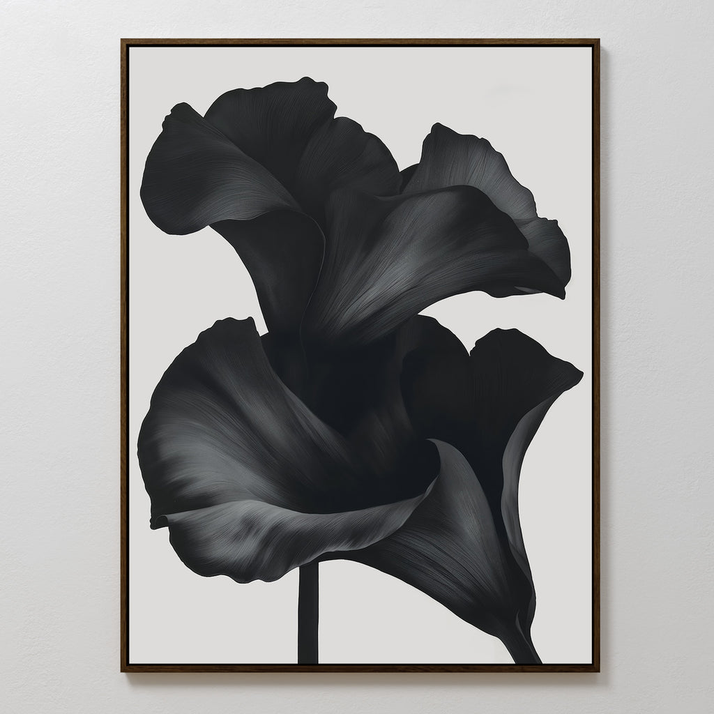 Noir Bloom Abstract Canvas Art showcases two bold, dark abstract calla lilies with flowing petals on a white background—a striking minimalist piece for modern living room decor.