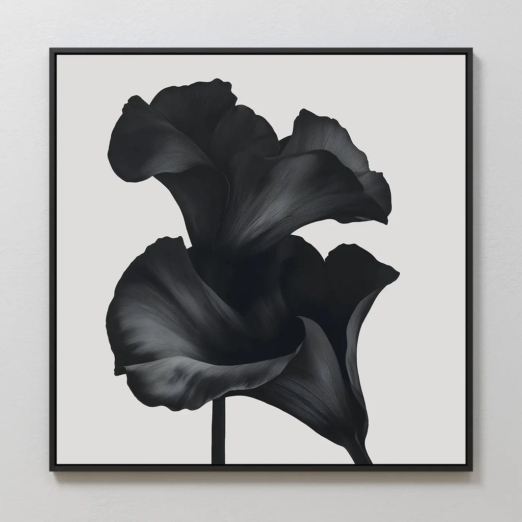 The Noir Bloom Canvas Art - Square showcases two large black calla lilies with elegant petals on a light background, ideal as minimalist wall art or for modern living room decor.